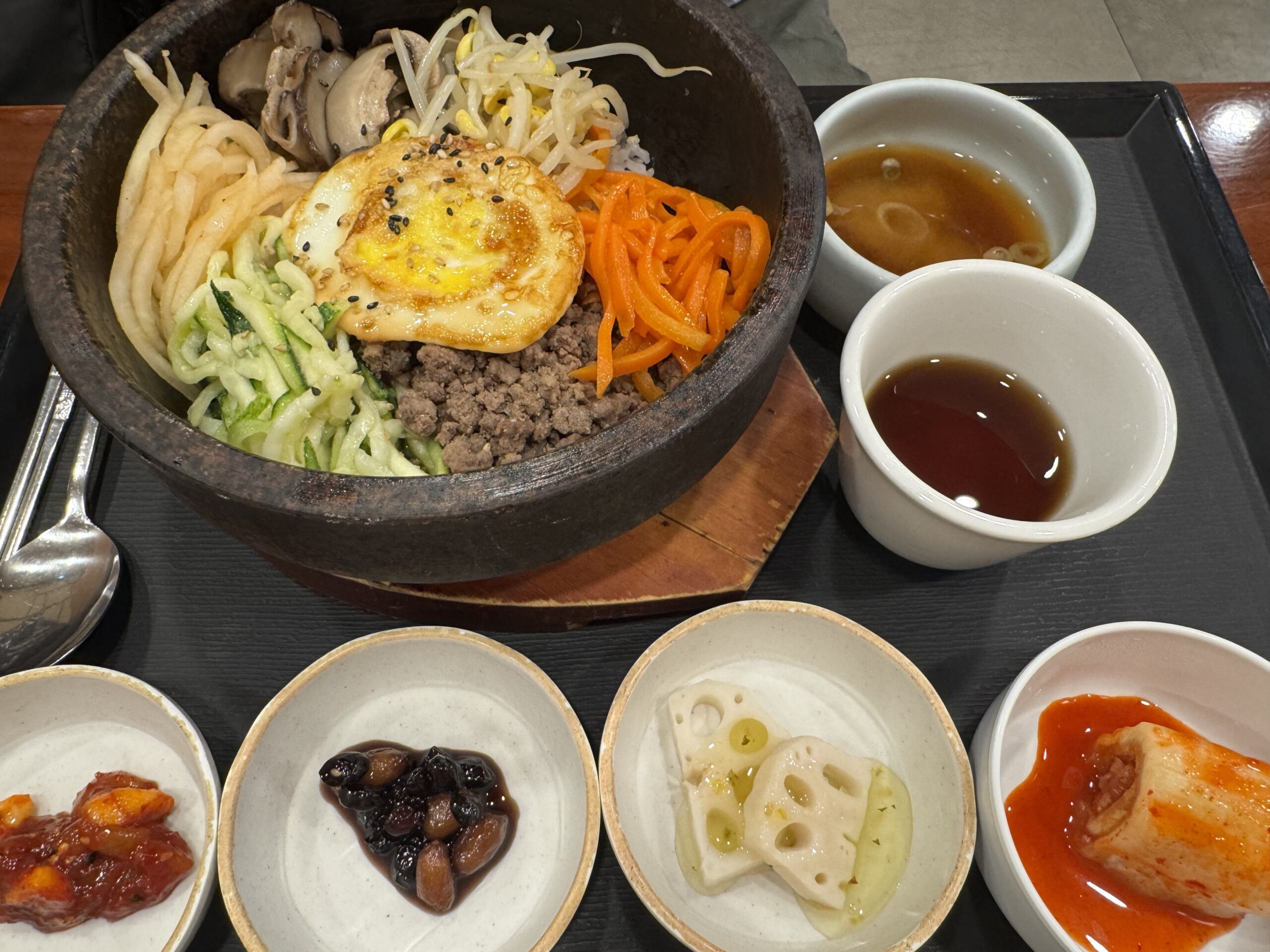 bibimbap korean rice bowl with vegetables and egg korean restaurant menu written in korean