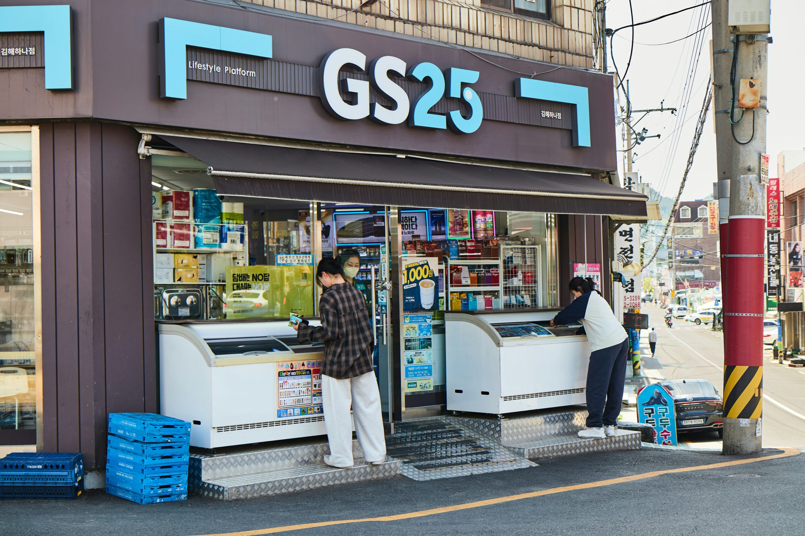 korean convenience store interior with food displays and hot snack section